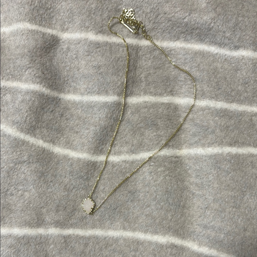 Kendra Scott Elegant Gold Necklace with White Pendant